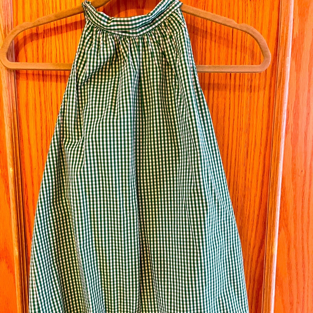 Sleeveless green and white gingham blouse